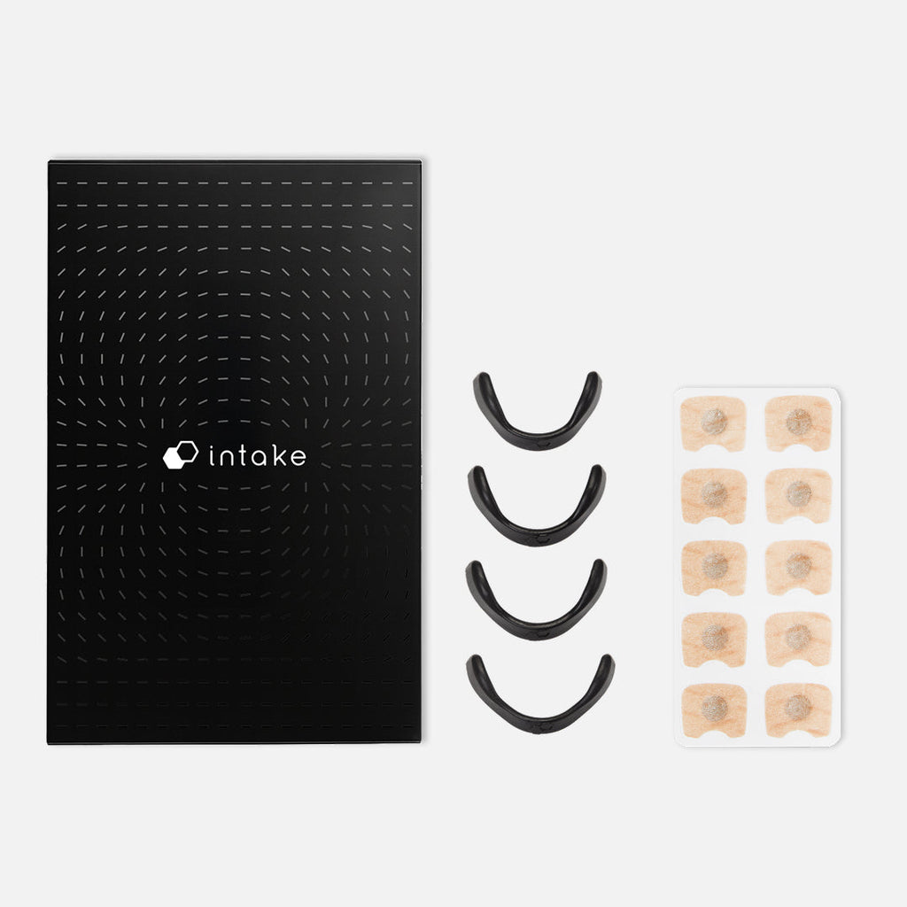 Intake Starter Kit featuring a black guidebook, four black nasal dilators, and adhesive strips.