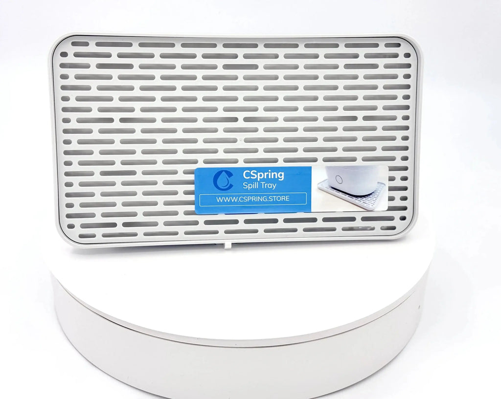 Spill protection tray for CPAP & CSpring