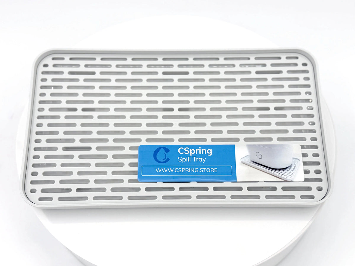 Spill protection tray for CPAP & CSpring