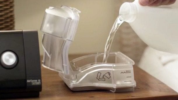 CPAP humidifier being filled