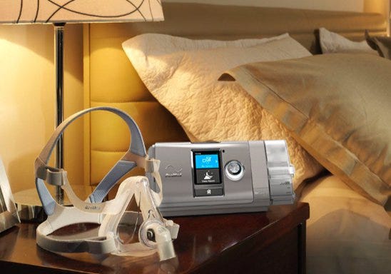 Example of ResMed's Vauto Aircurve BiLevel PAP (BiPap) machine on a beside table