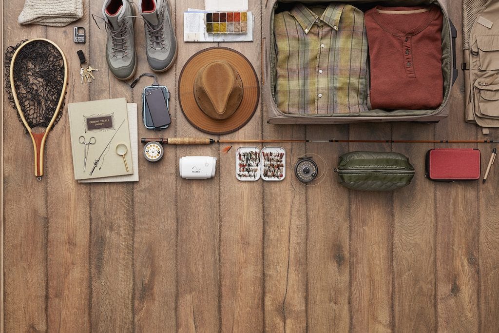 Fishing equipment organized on wood planks