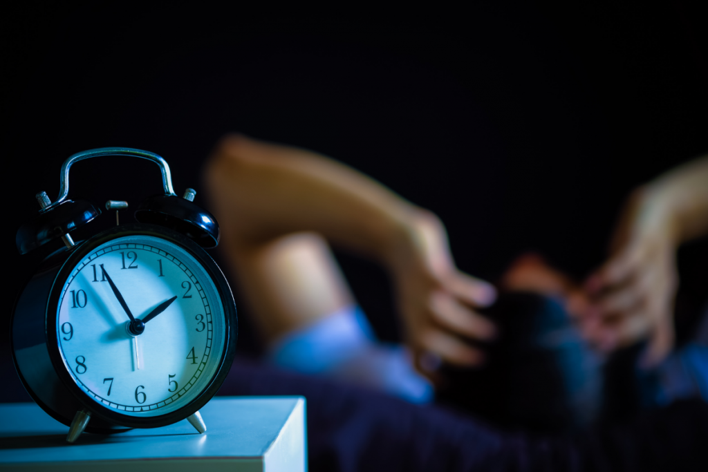 Alarm clock on nightstand. 